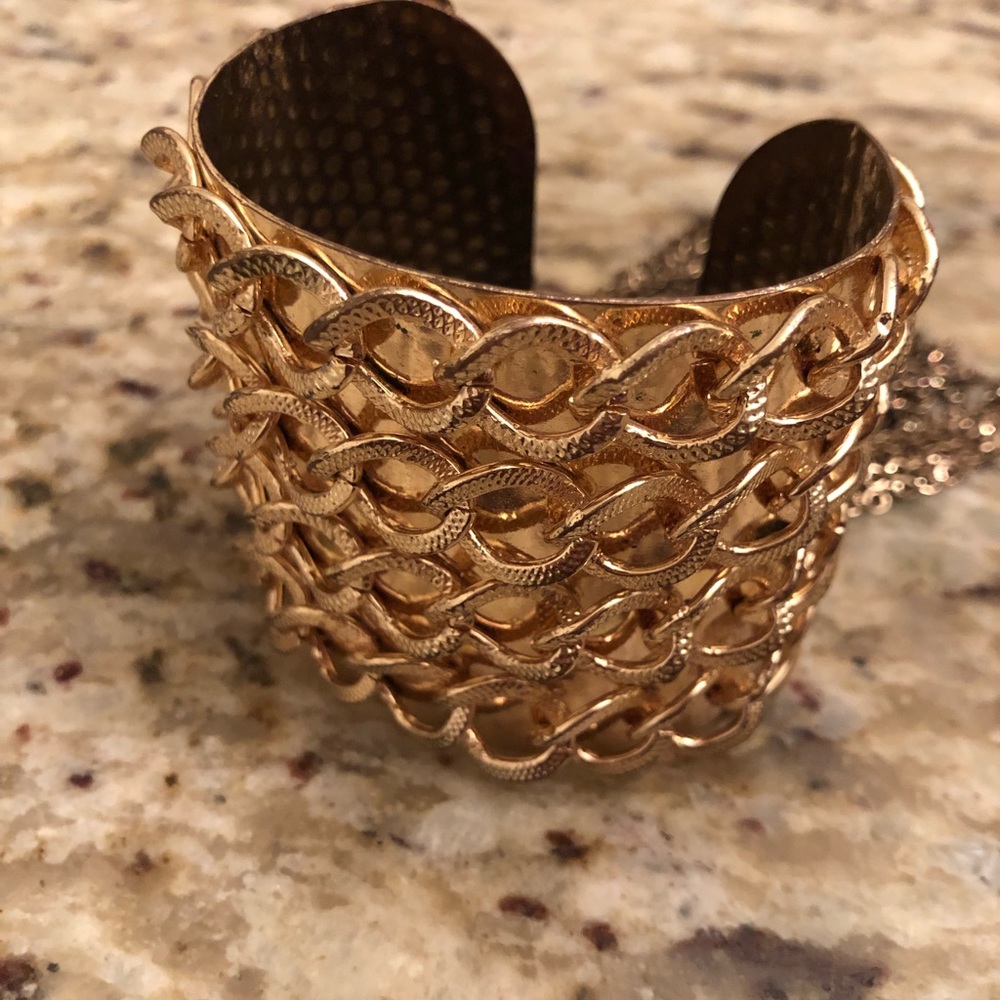Gold cuff with chains from BCBG